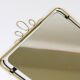 Wall mirror in brass wire with modernist loops from the mid-century, Italy, 1950s.