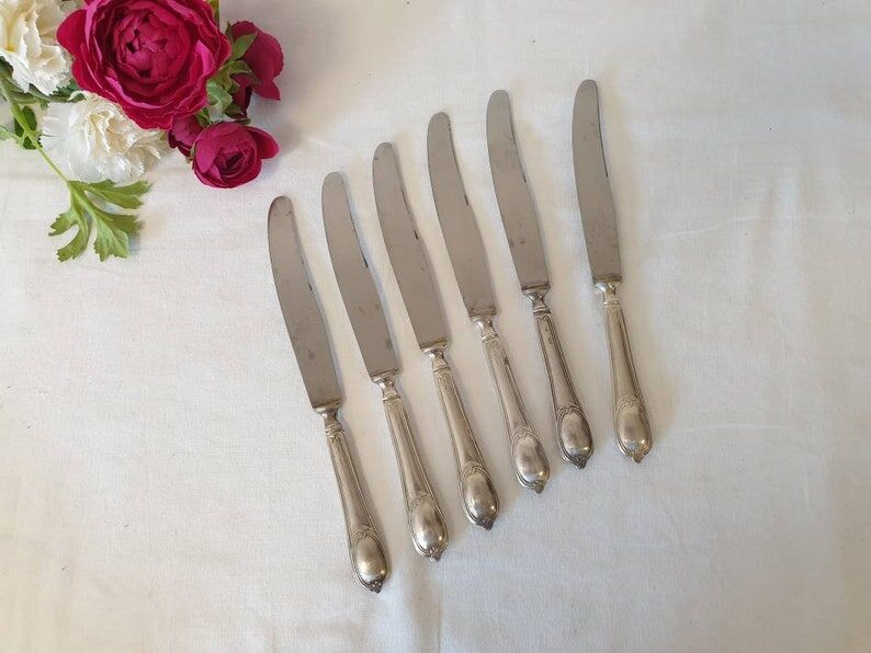 Large antique X6 knives made of silver metal