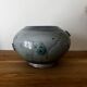 Magnificent pot or vase, handcrafted pottery with flowers, signed on the back.