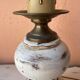 Round lamp base in white patina wood and brass