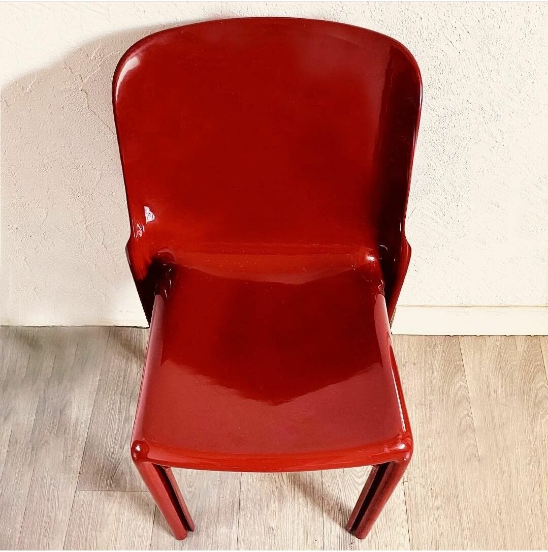 Red chair "selene" by vico magistretti for artemide of the 60s