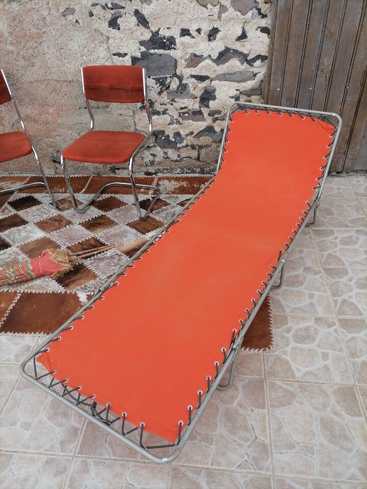 Sun lounger in orange fabrics 70s