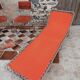 Sun lounger in orange fabrics 70s