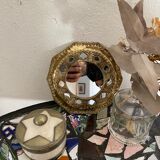 Antique mirror in worked brass