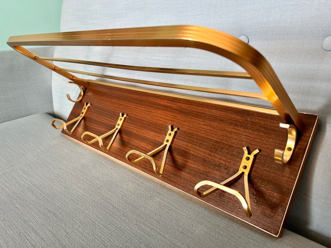 Vintage coat rack with 1970s repai décor