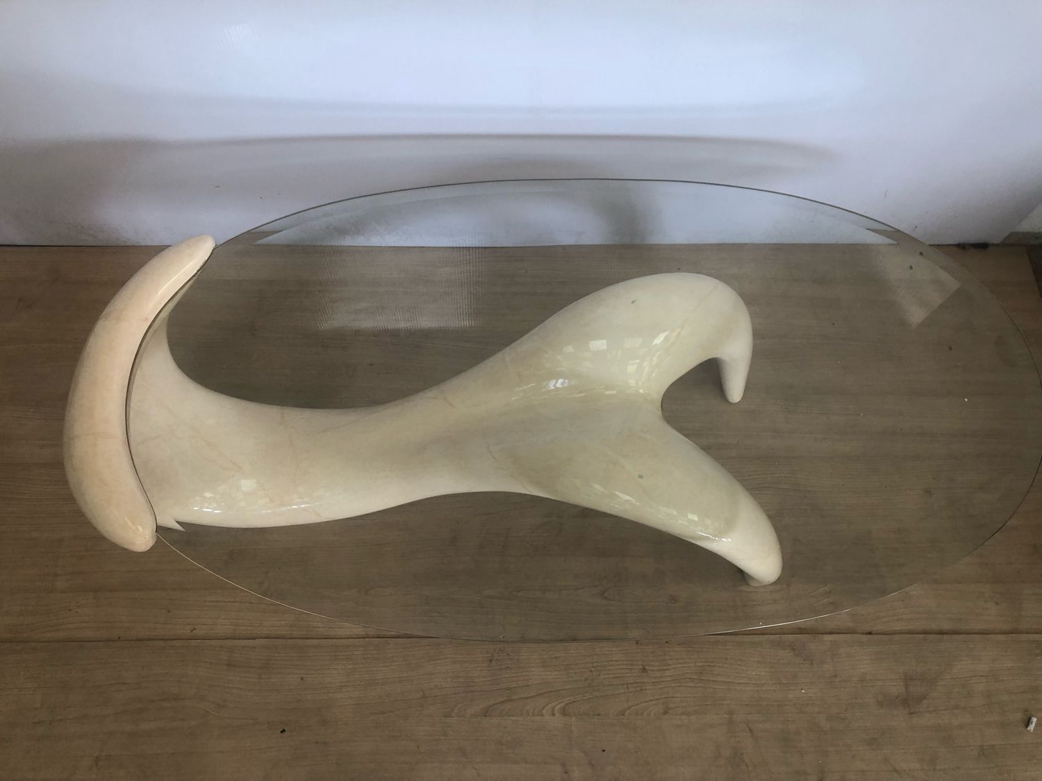 Abstract coffee table in the shape of a woman and marbled fiberglass