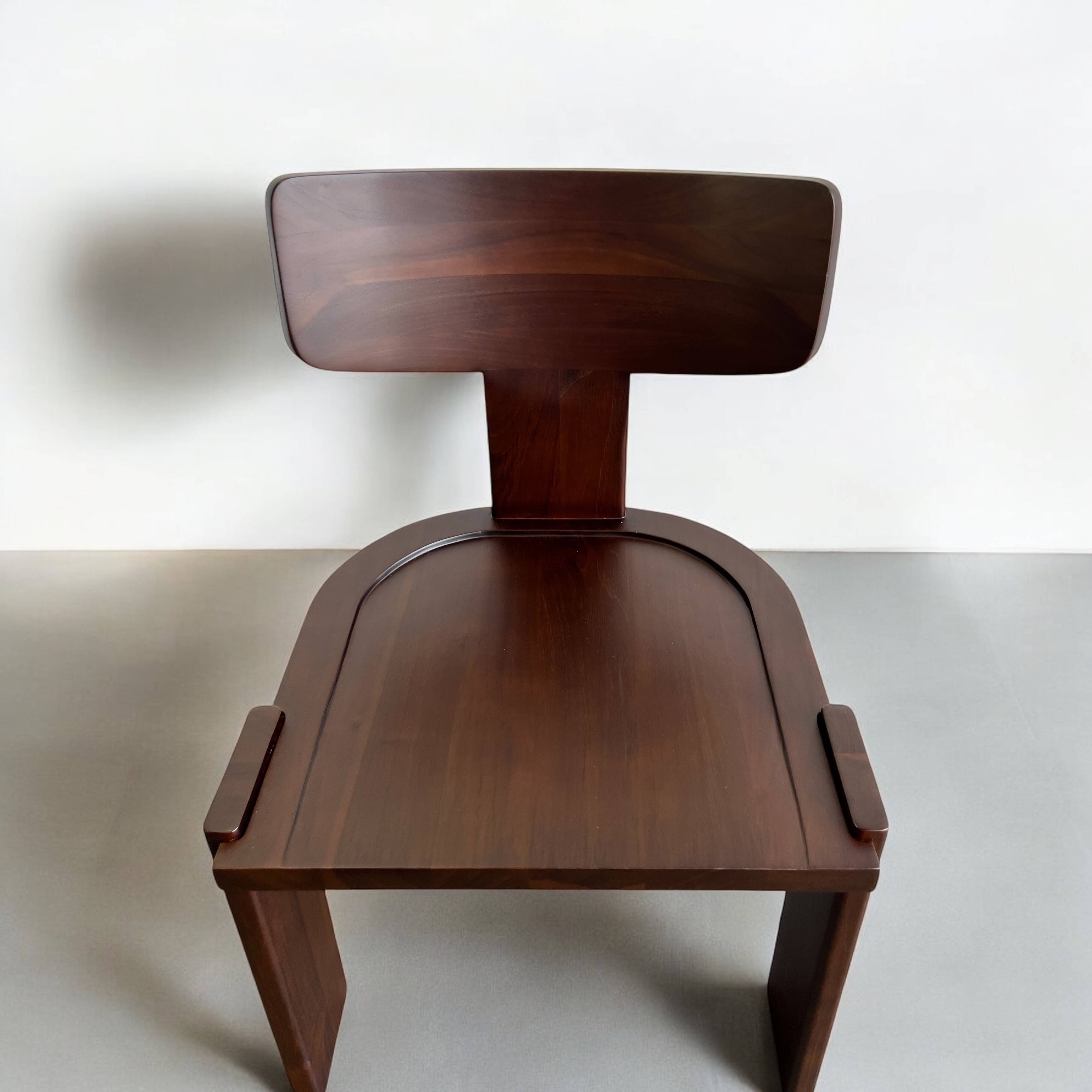 Retro brutalist chair in dark solid wood