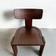 Retro brutalist chair in dark solid wood