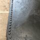 large industrial table in graphite black riveted metal