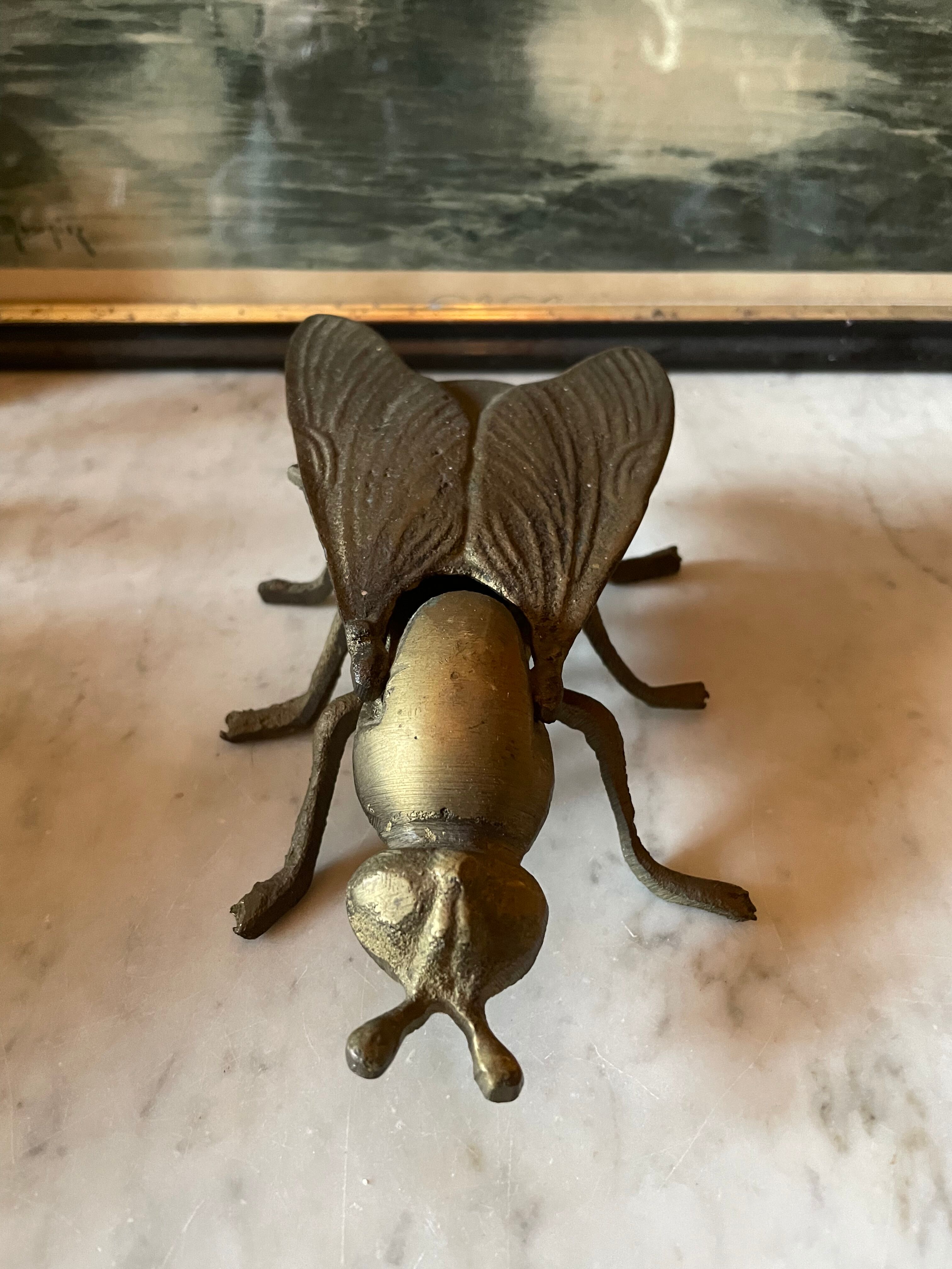 Golden metal insect ashtray
