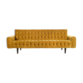 Mustard-colored design sofa from the "I love you etc."