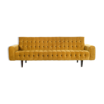 Mustard-colored design sofa from the "I love you etc."