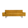 Mustard-colored design sofa from the "I love you etc."