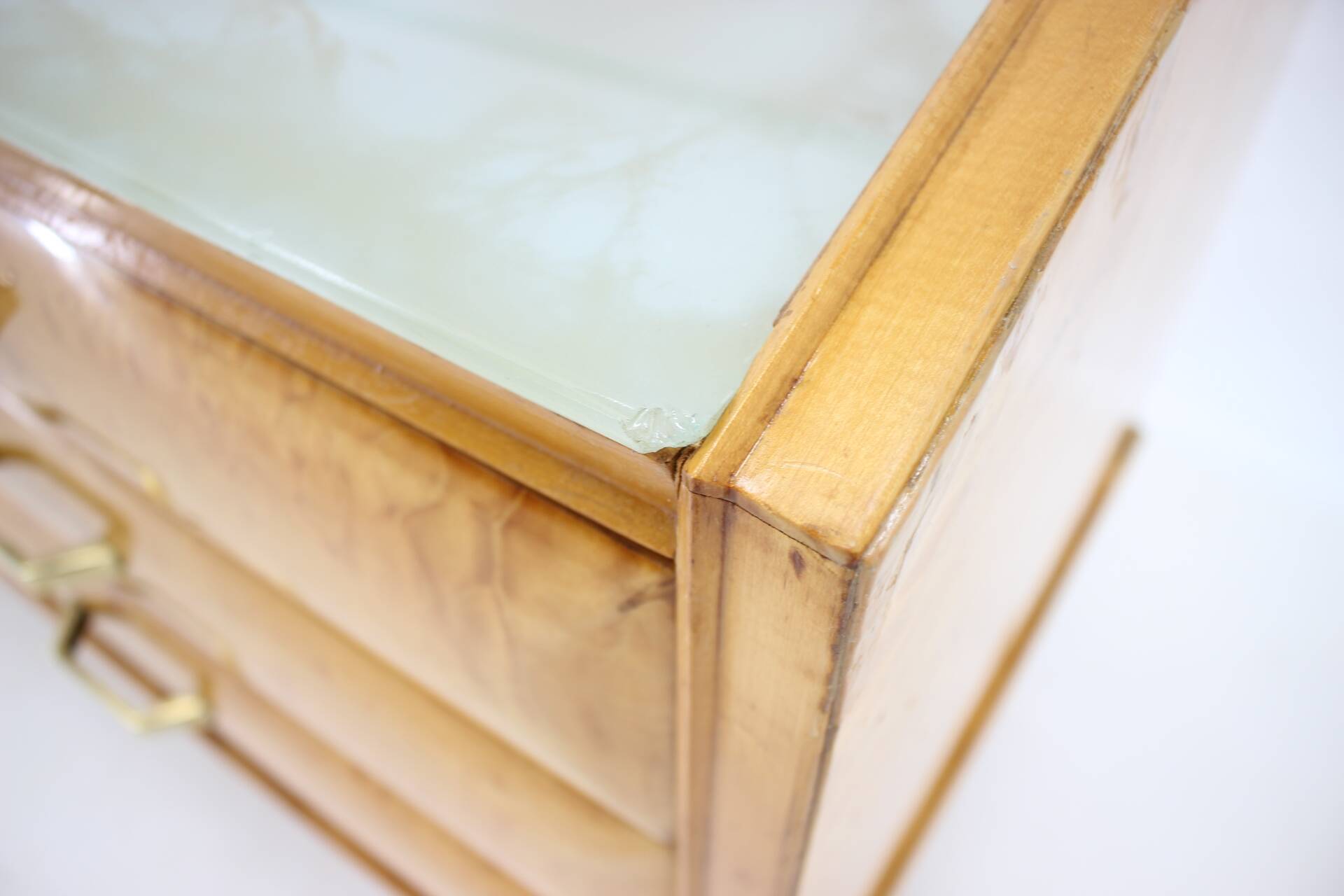 1960s italian sideboard/chest of drawers in high gloss finish with glass top and shelf