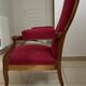 Antique Louis Philippe armchair in walnut and red fabric.