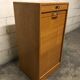 Vintage curtain-shaped binder in light honey-coloured oak