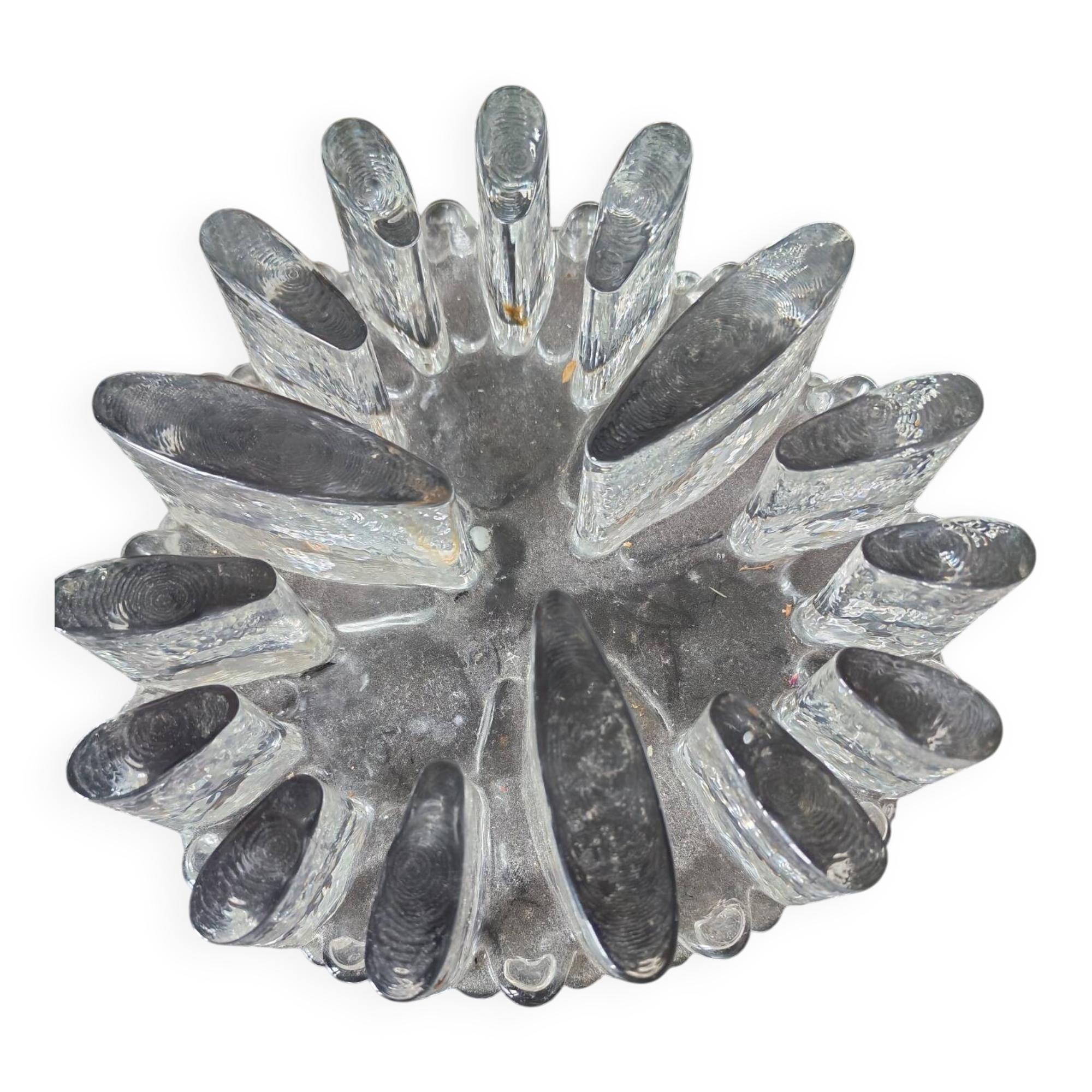 Large glass candle holder in iceberg brutalist style.