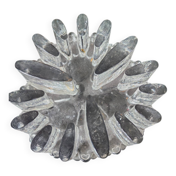 Large glass candle holder in iceberg brutalist style.