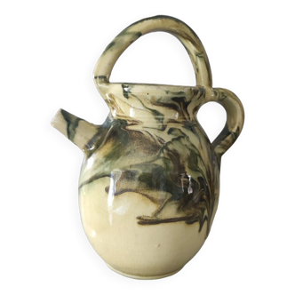 Yellow and green glazed ceramic jug