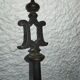 Pelle de cheminée sculptée en fonte