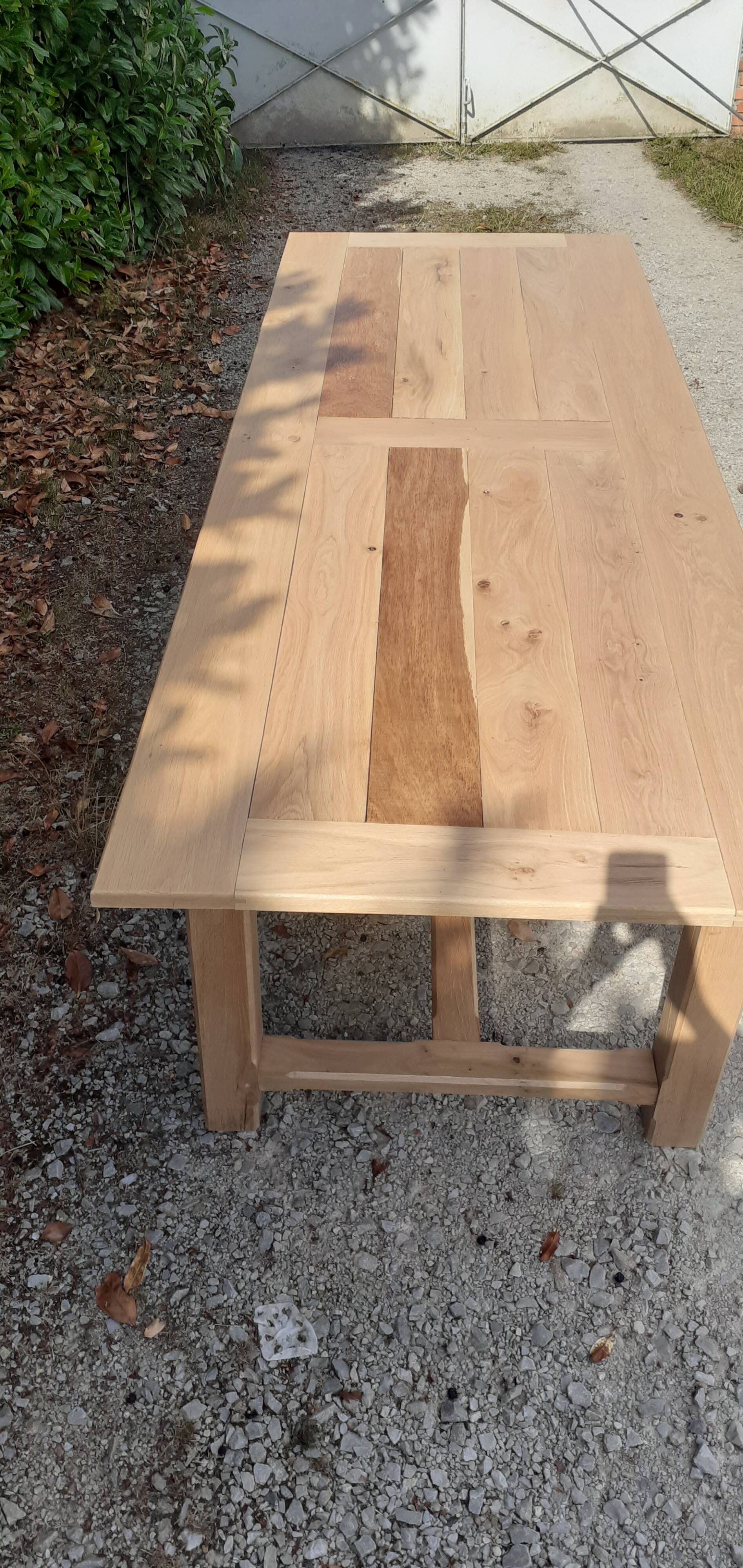 Large solid oak farmhouse table in raw wood