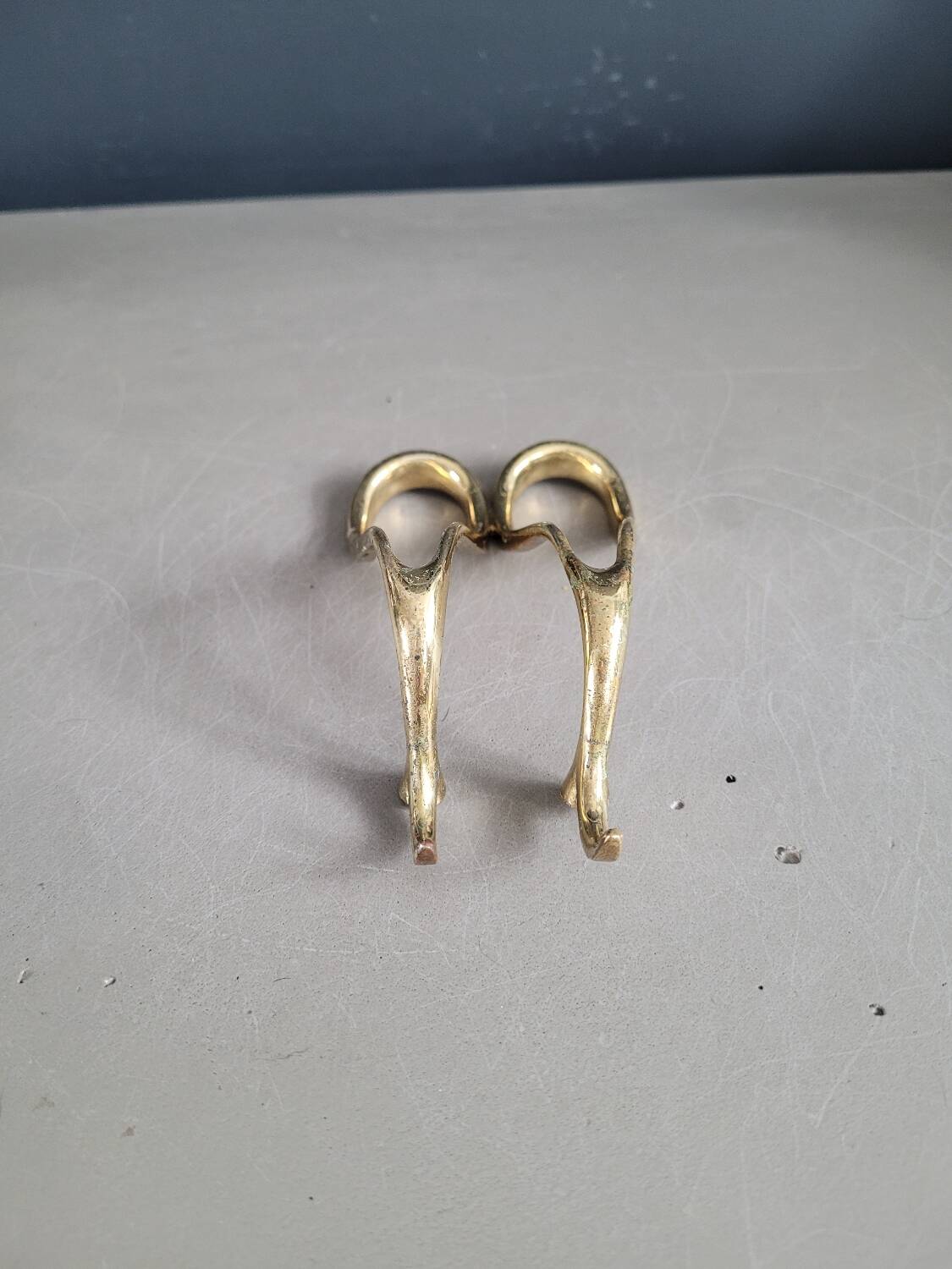 Antique brass pipe holder