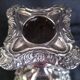 Candlestick in silver metal