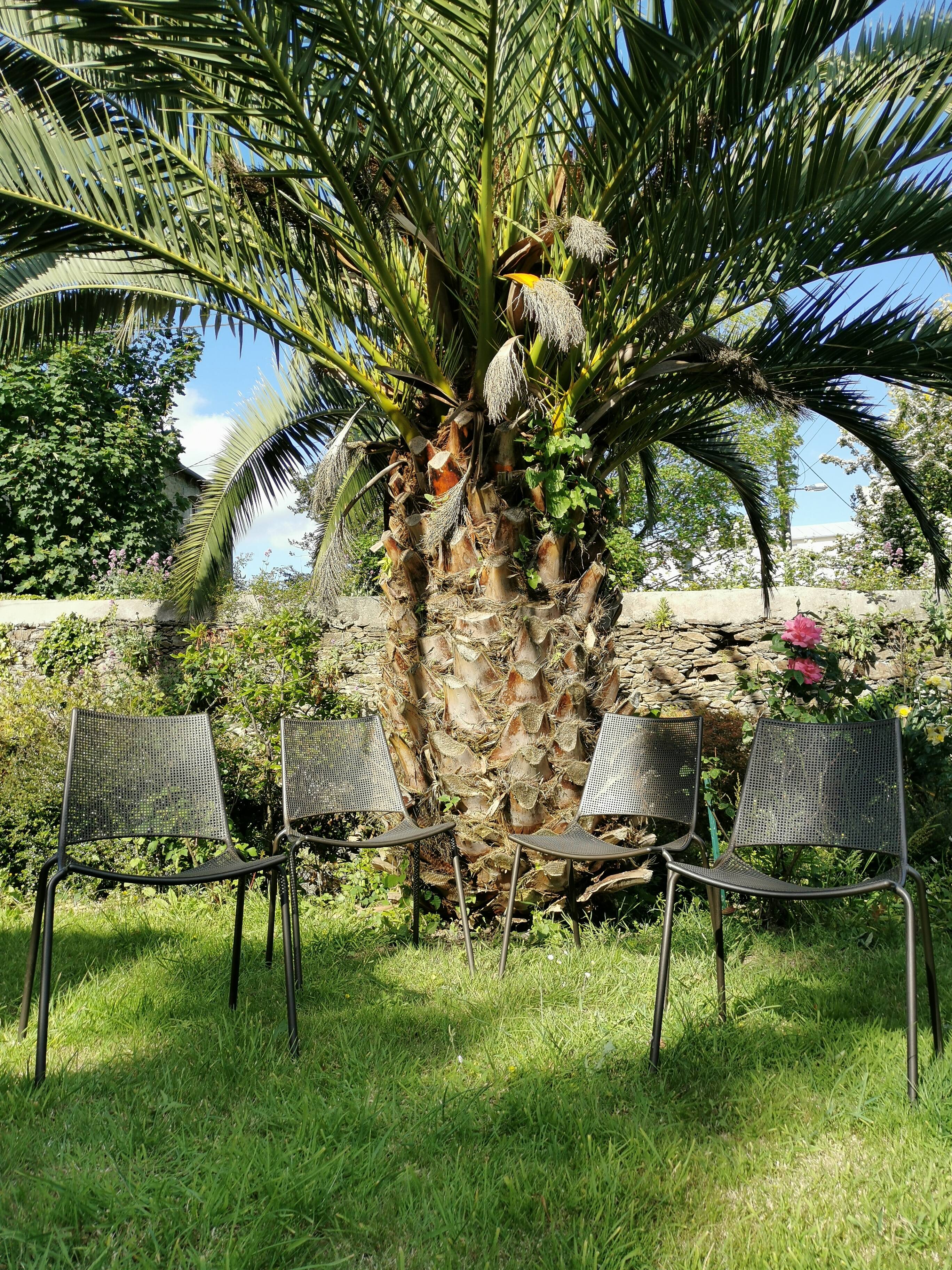 4 Emu garden chairs stackable design