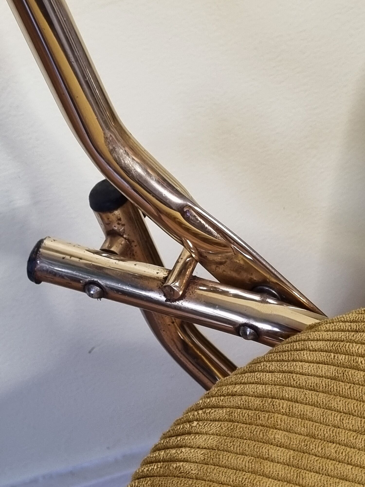 Pair of vintage folding chairs in gilded metal and 70s fabrics, restored