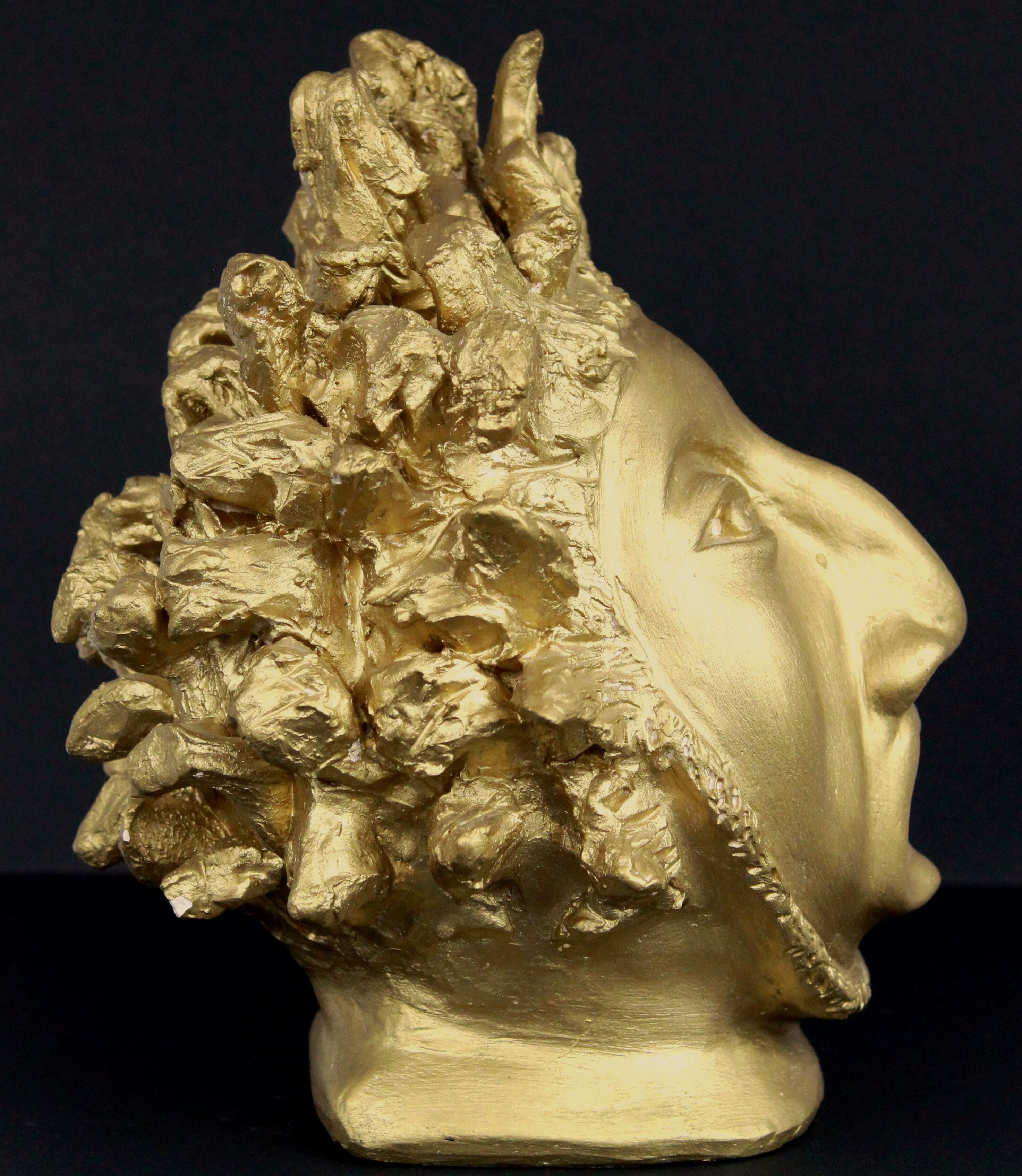 Head plaster gold paint