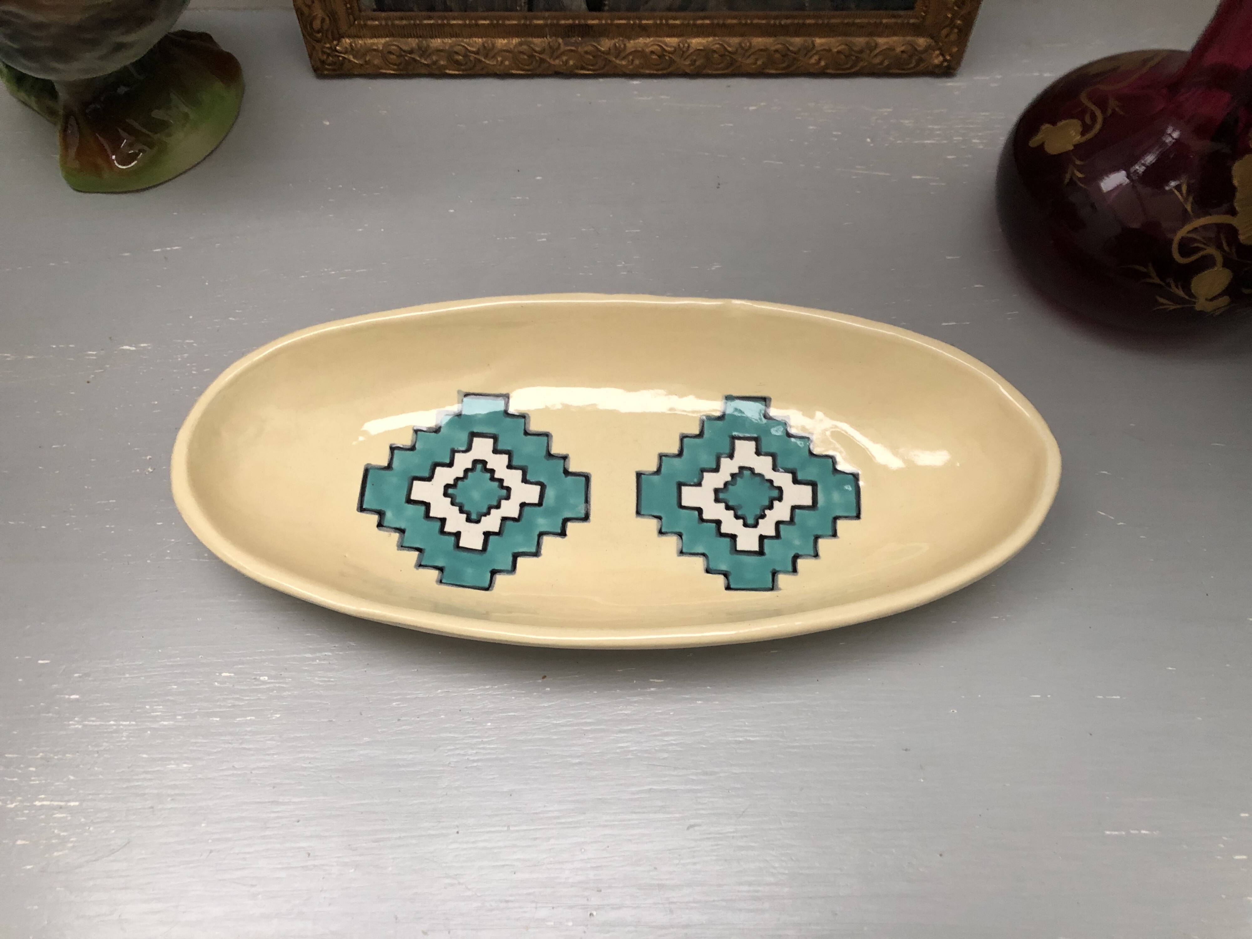 Plat vide poche en céramique design