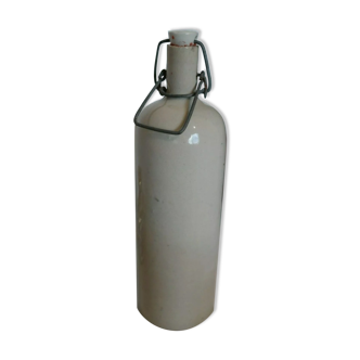 Sandstone bottle and porcelain cap