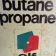 Plaque publicitaire Monogaz en tôle