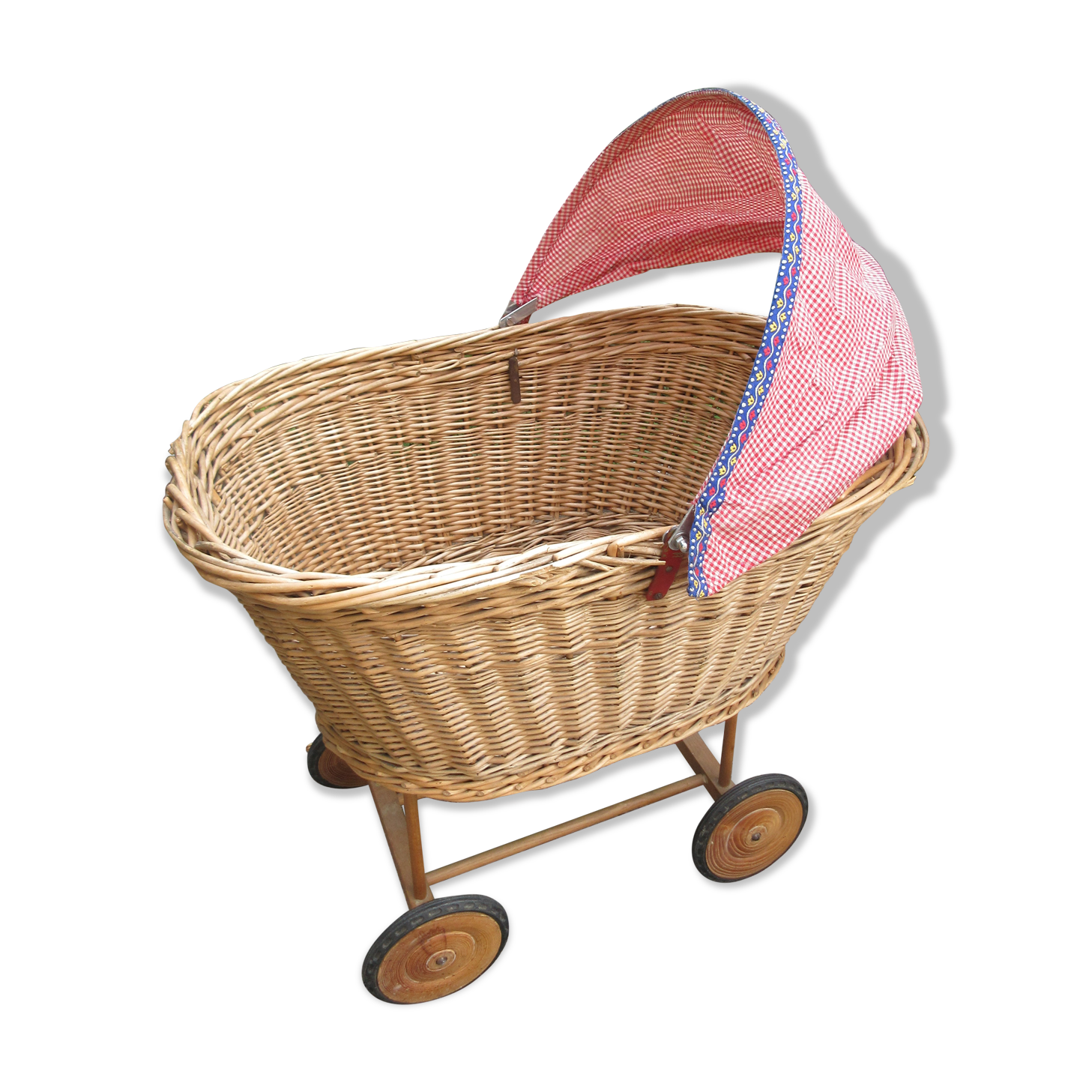 Doll cradle on wicker wheels