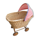Doll cradle on wicker wheels