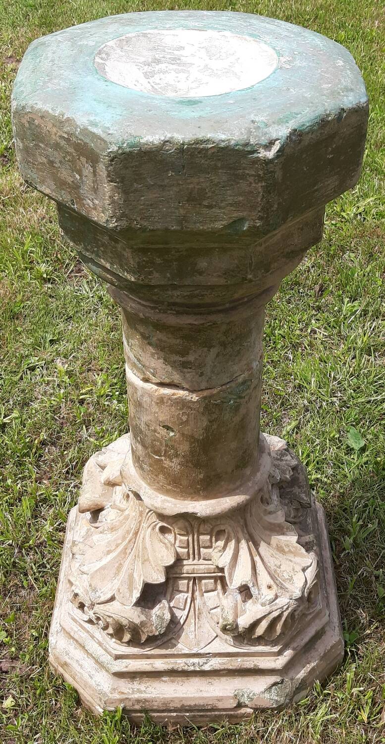 Holy water font on stone column (17th century)
