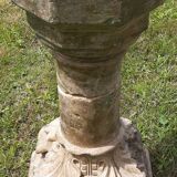Holy water font on stone column (17th century)