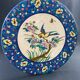 Large circular earthenware dish from Louvière with Longwy style bird decoration