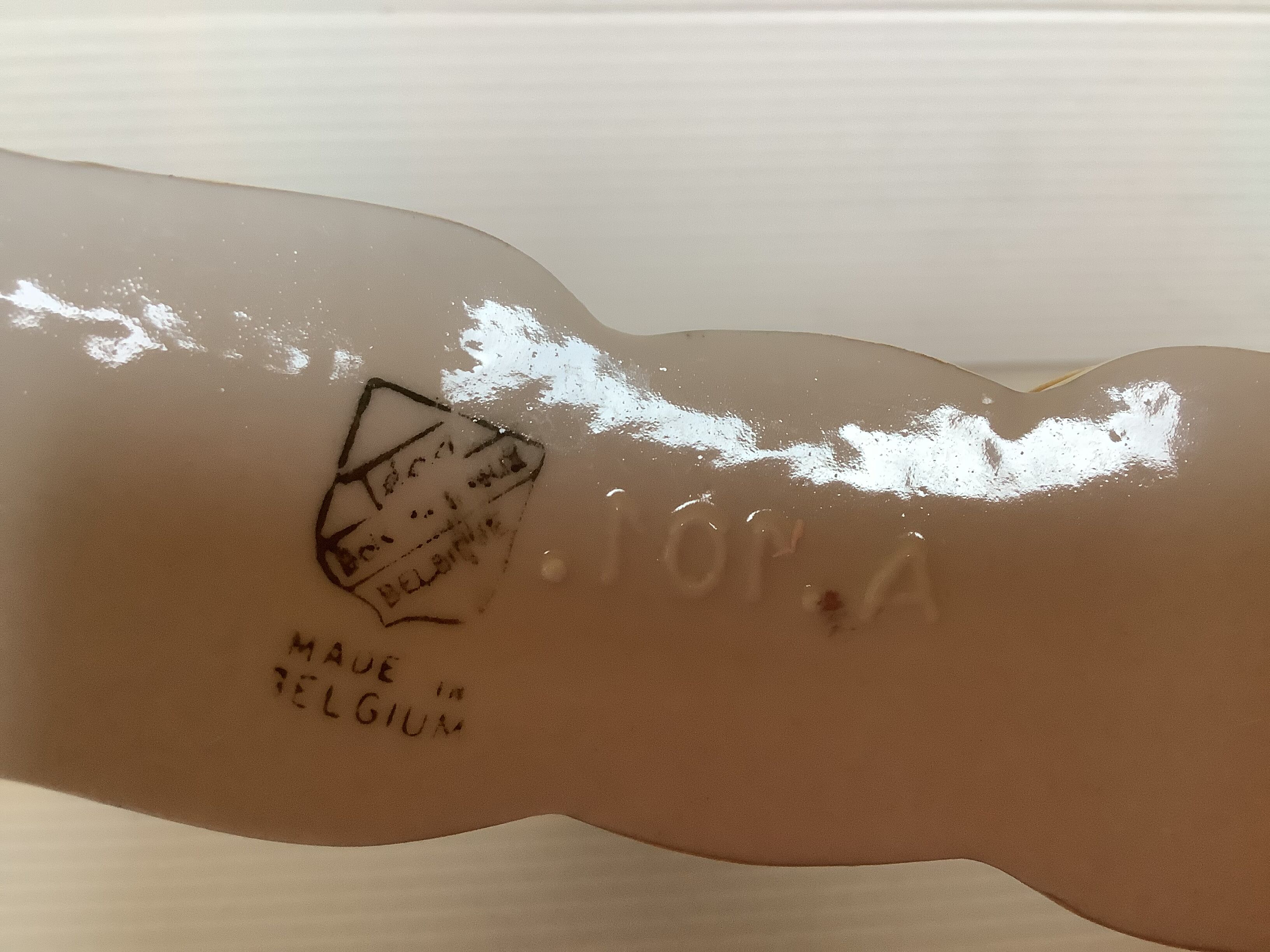 Old white and gold candlestick Belgium