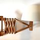 Extendable wooden wall lamp
