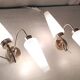 Asymmetrical brass wall lights with opaline shades, 1950s-60s.
