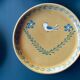 The six Piaf plates in painted terracotta