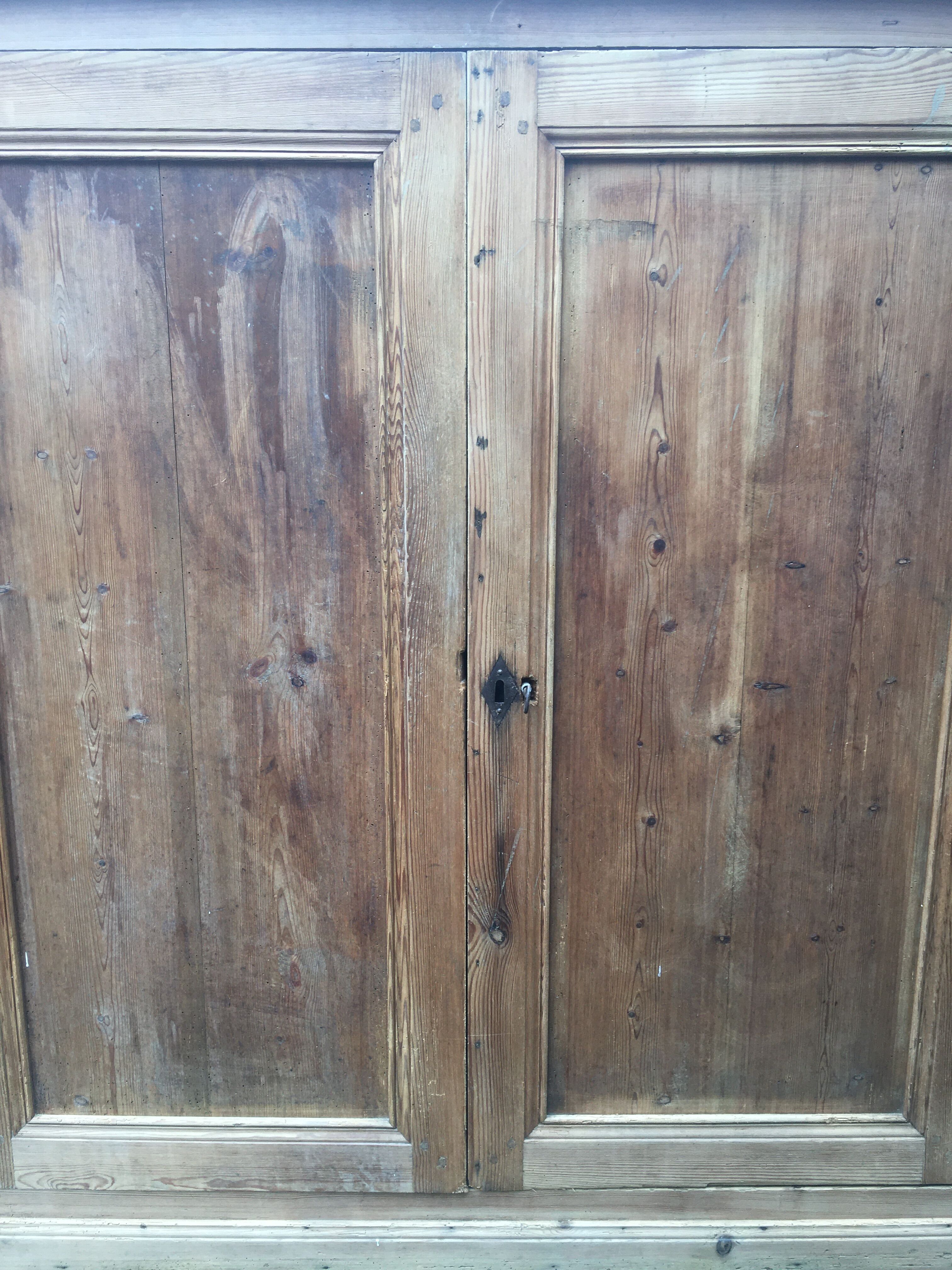 Wooden cabinet with interior doors