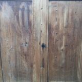 Wooden cabinet with interior doors