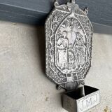 Small wall-mounted holy water font