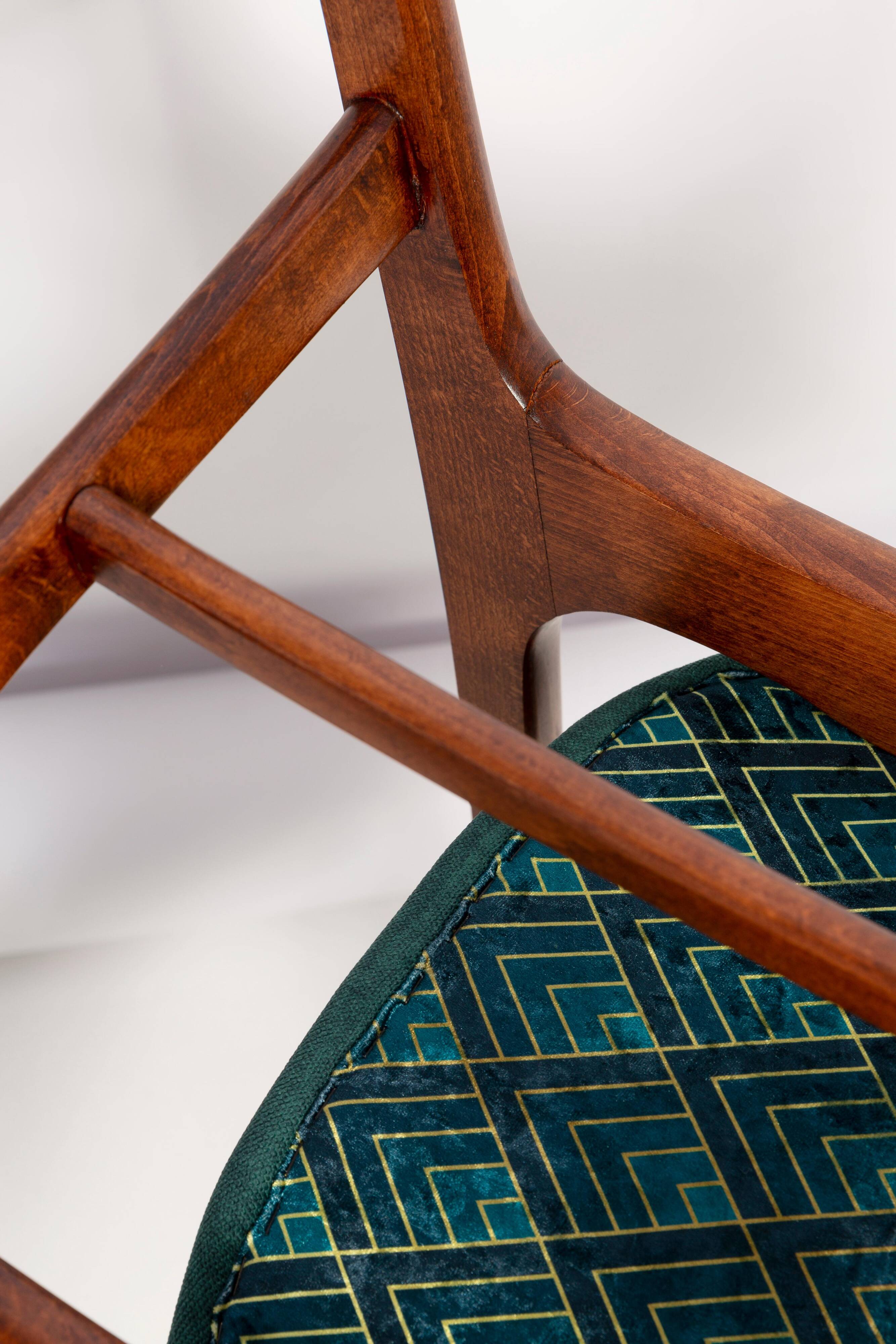Green velvet Mid-Century chair designed by Rajmund Hałas, Poland, 1960s.