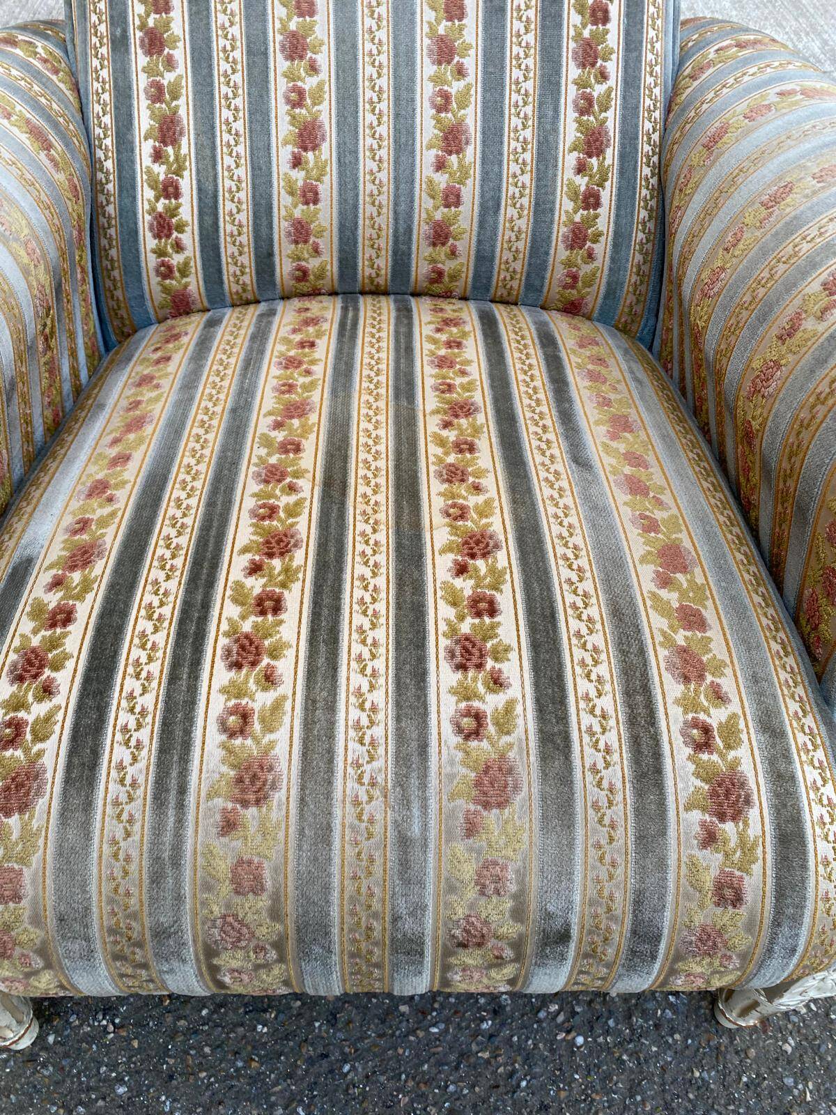 2 Louis XVI bergère armchairs in solid wood with beige and blue embroidered fabric.