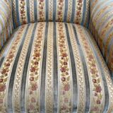 2 Louis XVI bergère armchairs in solid wood with beige and blue embroidered fabric.