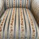 2 Louis XVI bergère armchairs in solid wood with beige and blue embroidered fabric.