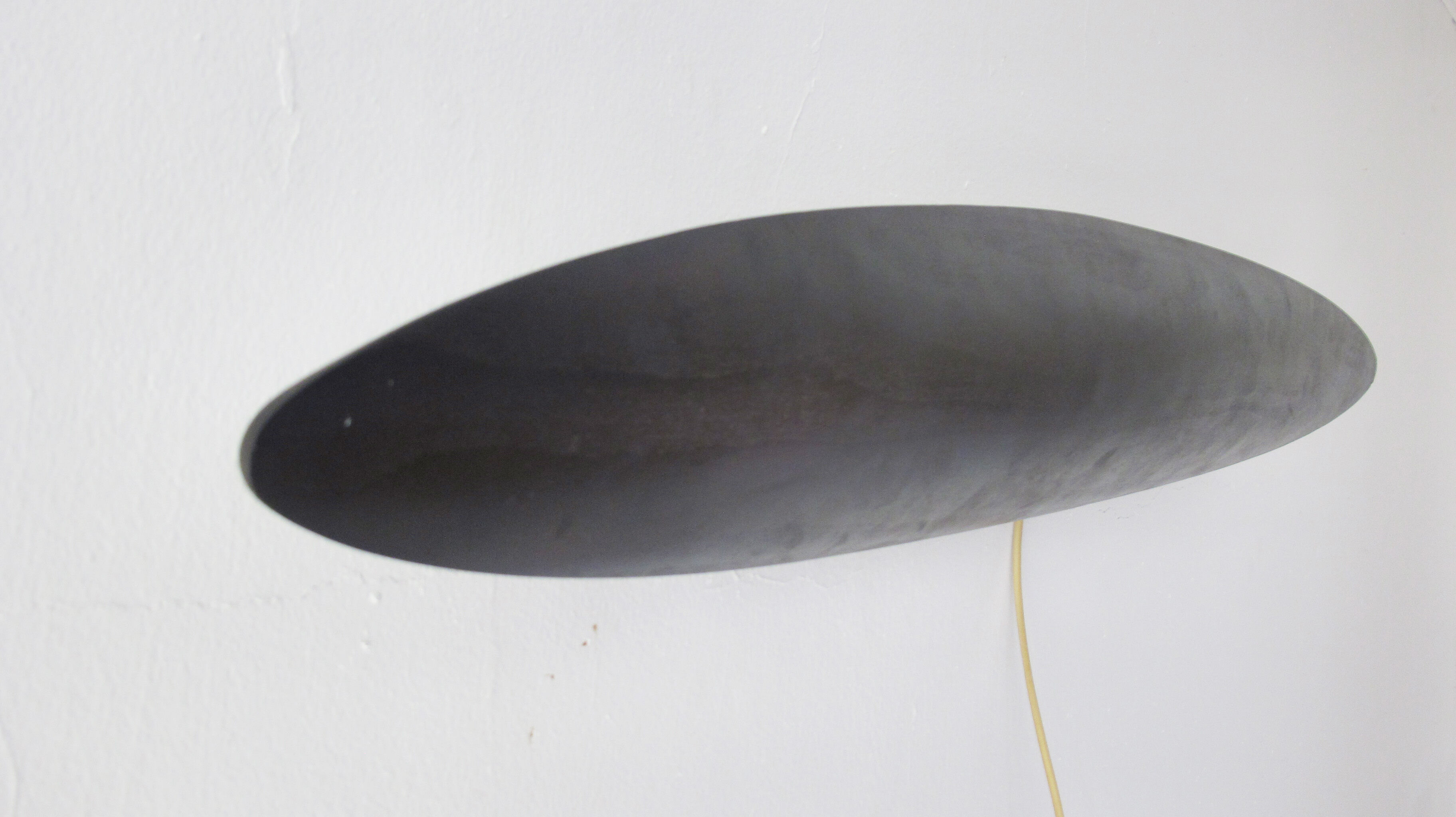 Applied in minimalist black stained wood